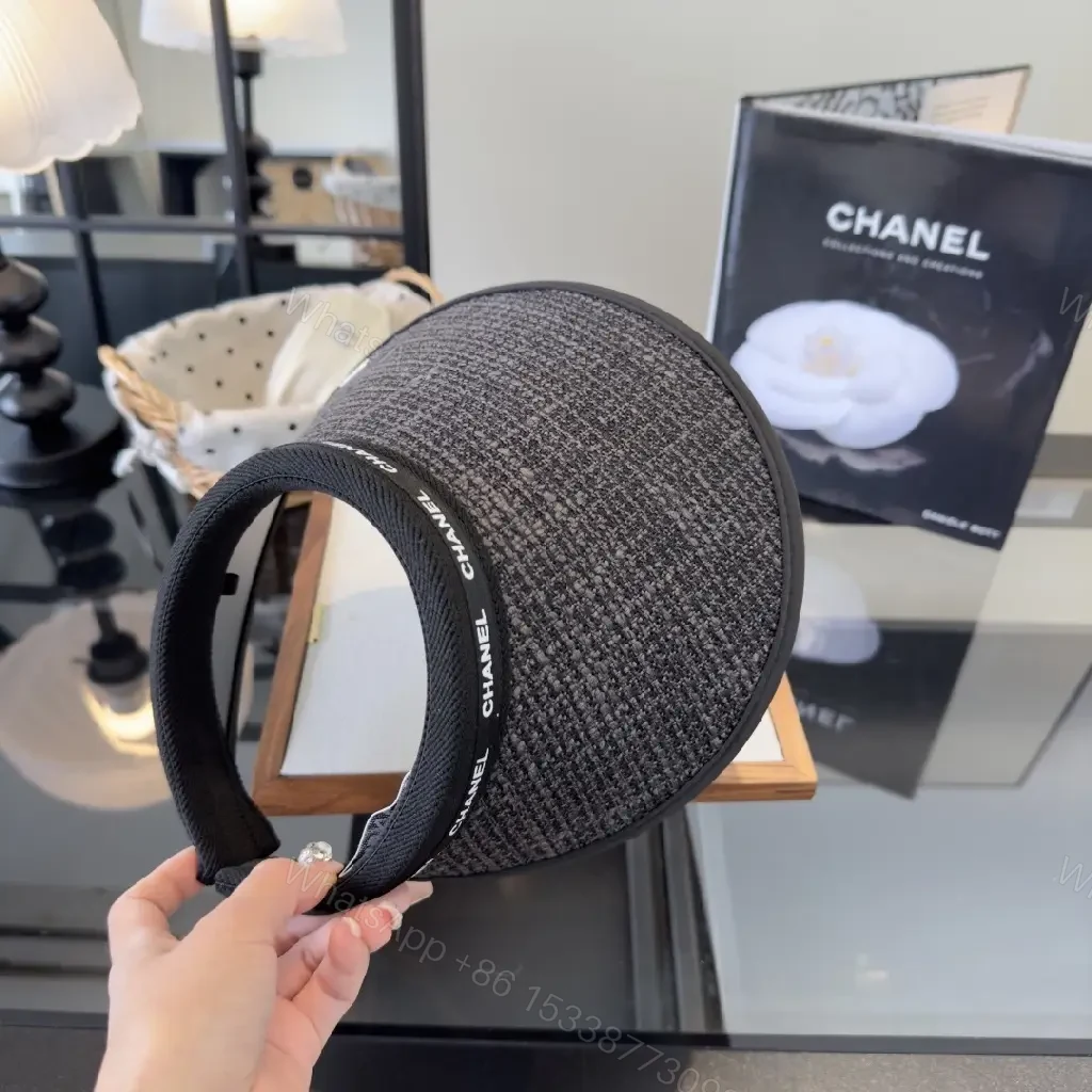 View 6 of Dark Gray Tweed Visor Cap with White Chanel Logo and Silver Emblem