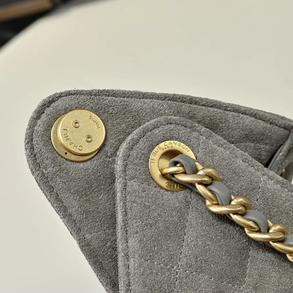 View 8 of Gray Quilted Bucket Bag with Gold Chain – Modern Texture, Everyday Versatility
