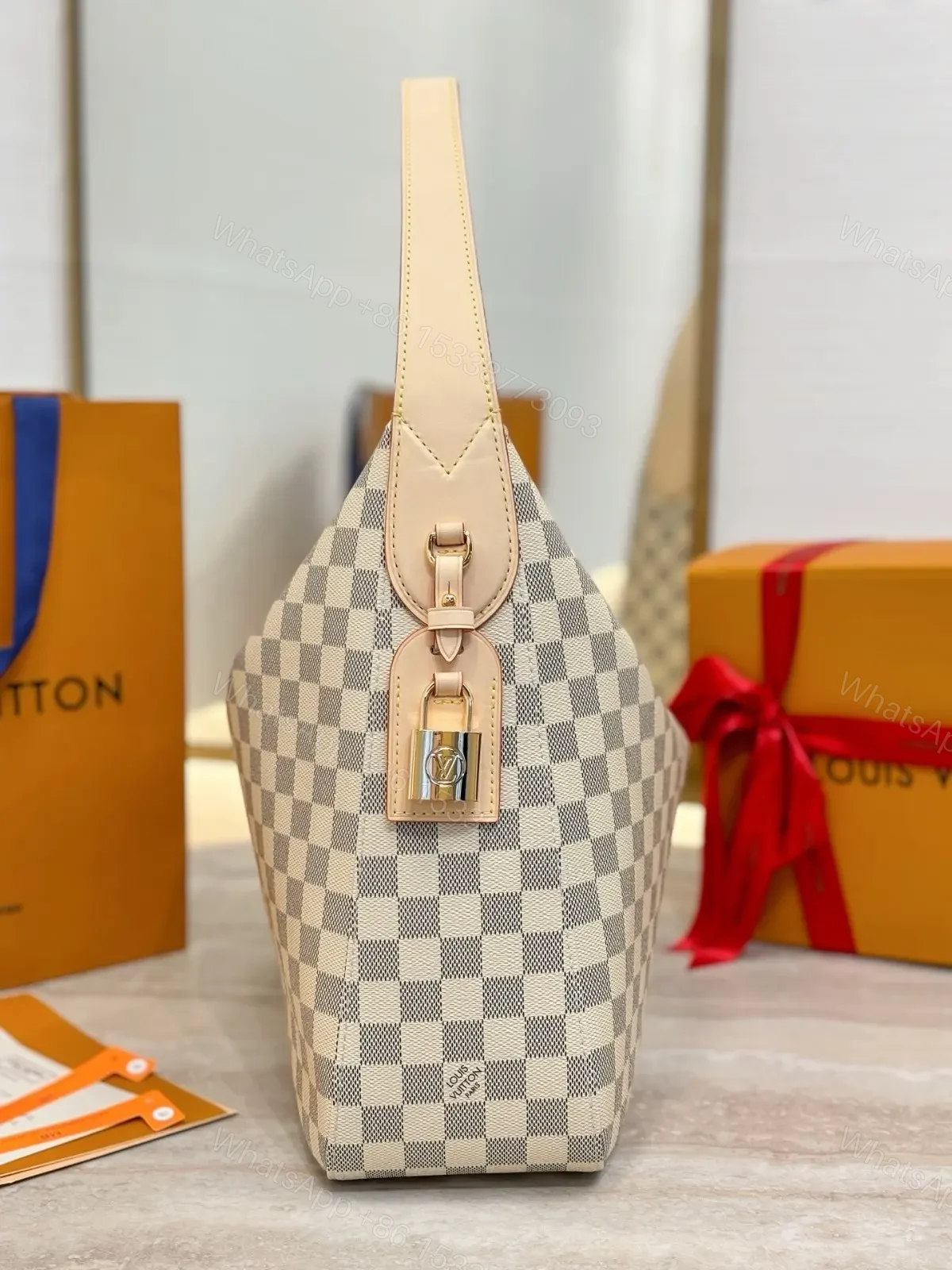 View 5 of Louis Vuitton Damier Azur Slouchy MM
