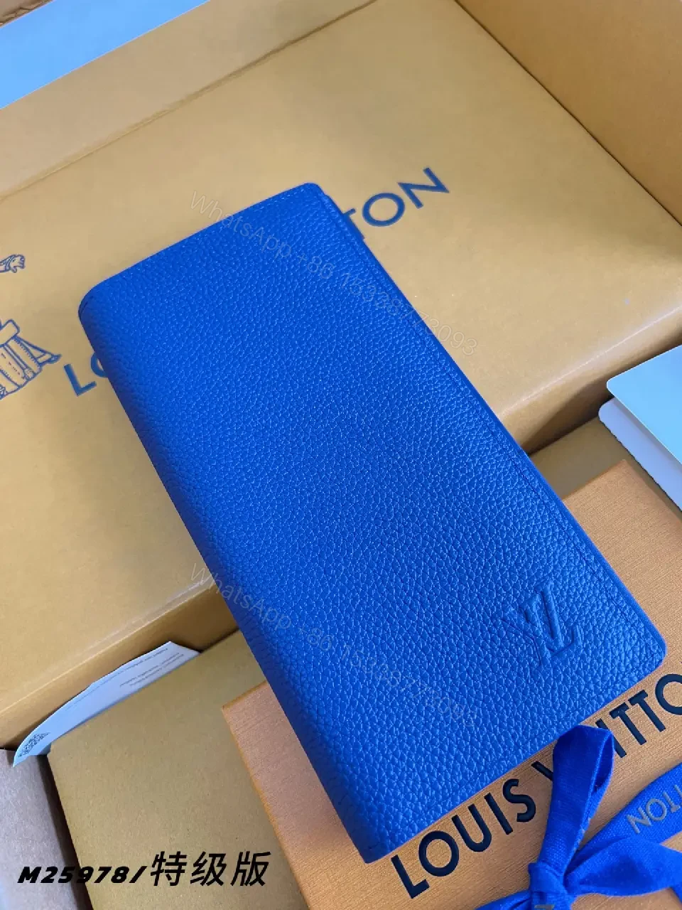 View 6 of Blue Pebbled Leather Wallet, Rectangular, Folded, LV-Embossed Style