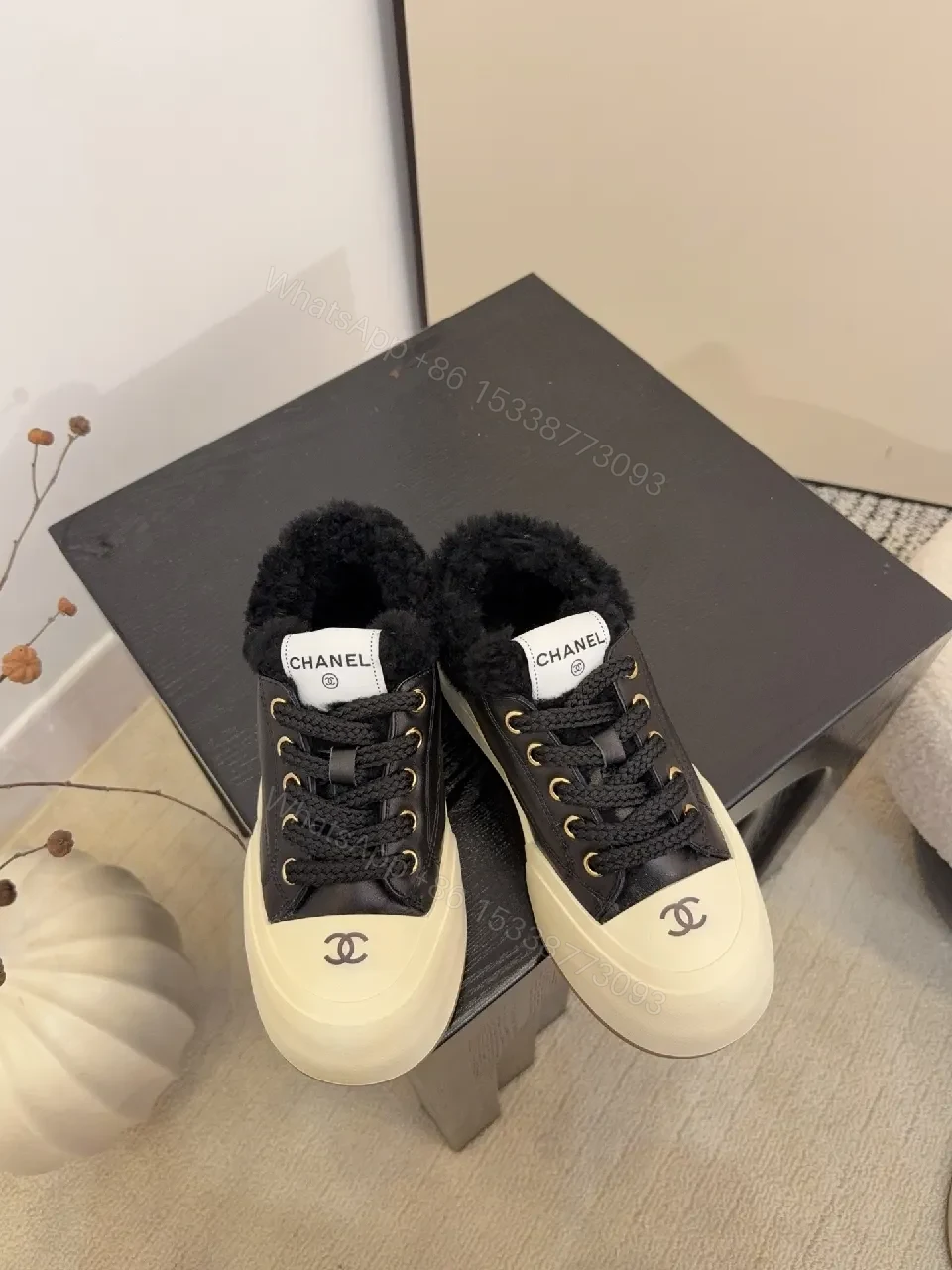 Chic Leather High-Top Sneakers with Plush Warmth and Accents — view 1