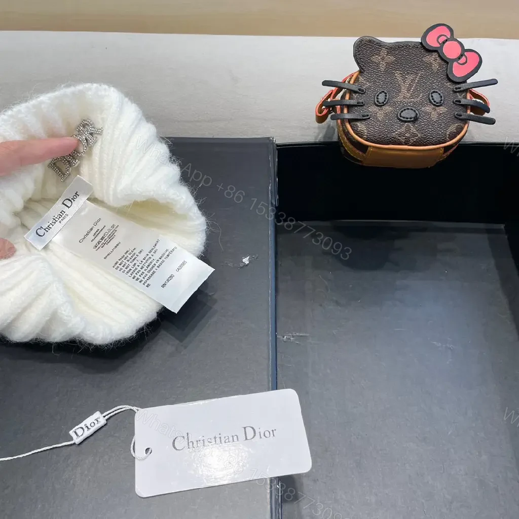 View 9 of White Knit Beanie with Dior Embellishment: Cozy Luxury
