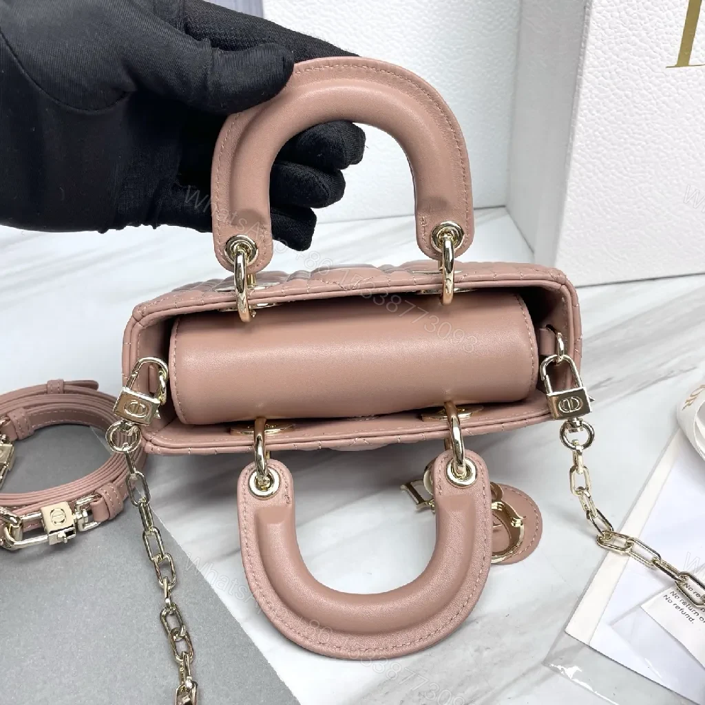 View 7 of Soft Pink Quilted Mini Crossbody with Gold Charms - Compact Luxury Bag