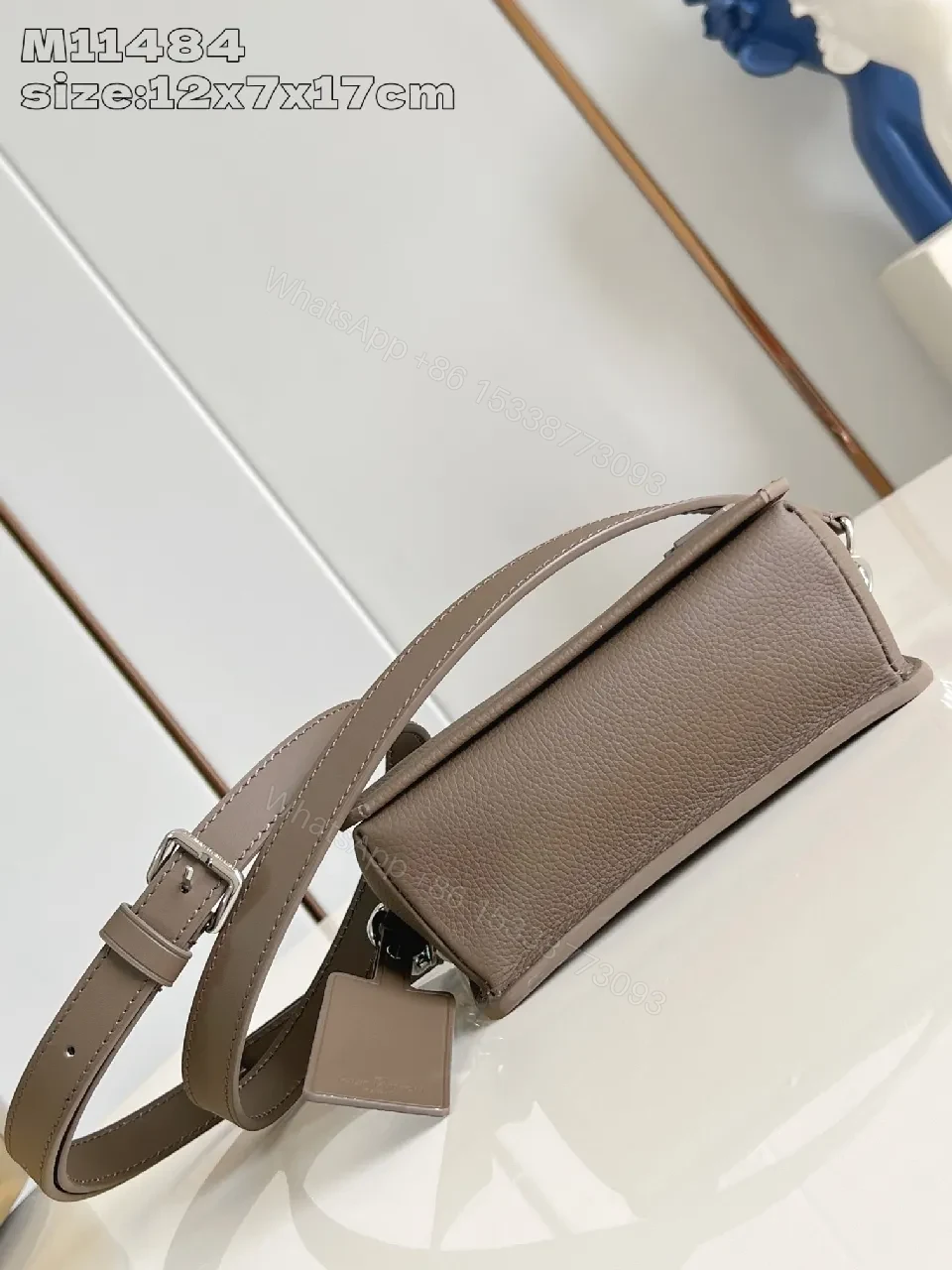 View 5 of Taupe Pebble-Grain Crossbody: Compact Luxury Bag with Subtle Logo