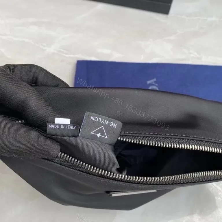 View 4 of Prada Re-Nylon Compact Pouch: Sleek, Everyday Luxury