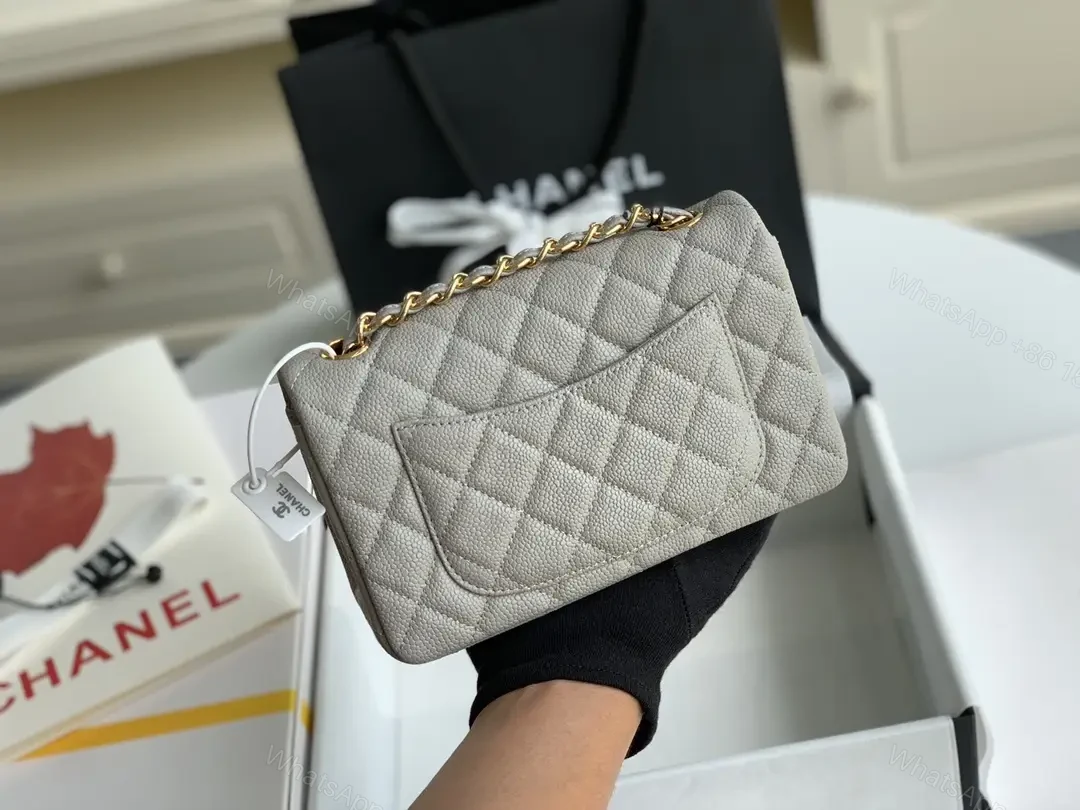 View 7 of Quilted Leather Crossbody: Compact Luxury with Gold Hardware