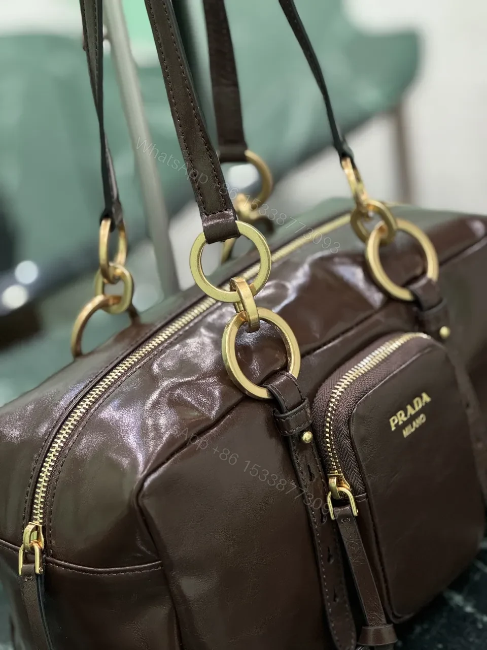 View 9 of Chic Black Leather Handbag with Gold Hardware & Structure