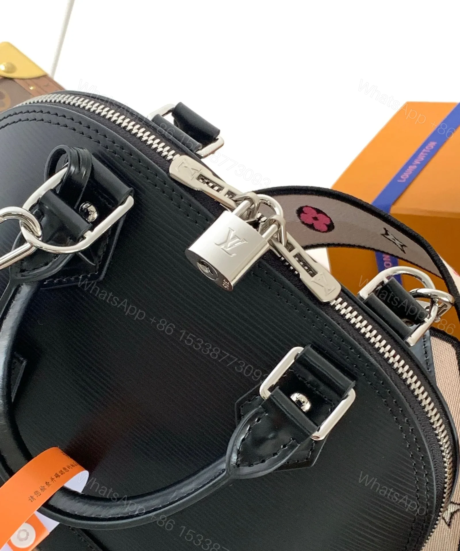 View 3 of LV ALMA BB BAG 23 IN BLACK GRAIN COWHIDE