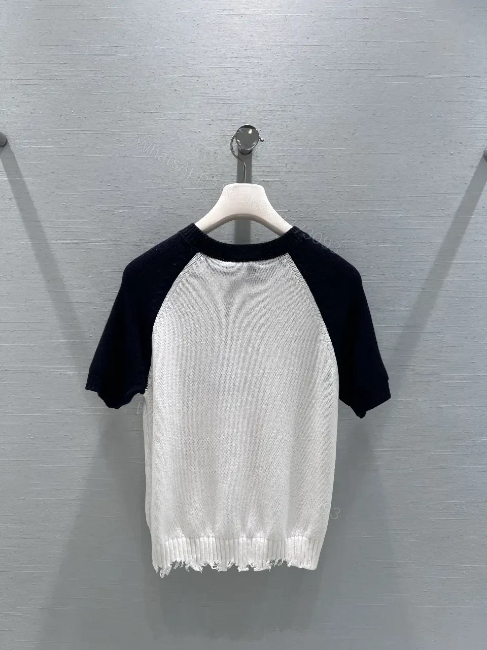 View 3 of Two-Tone Knit Tee with Signature Logo Emblem - Modern Luxury Casual