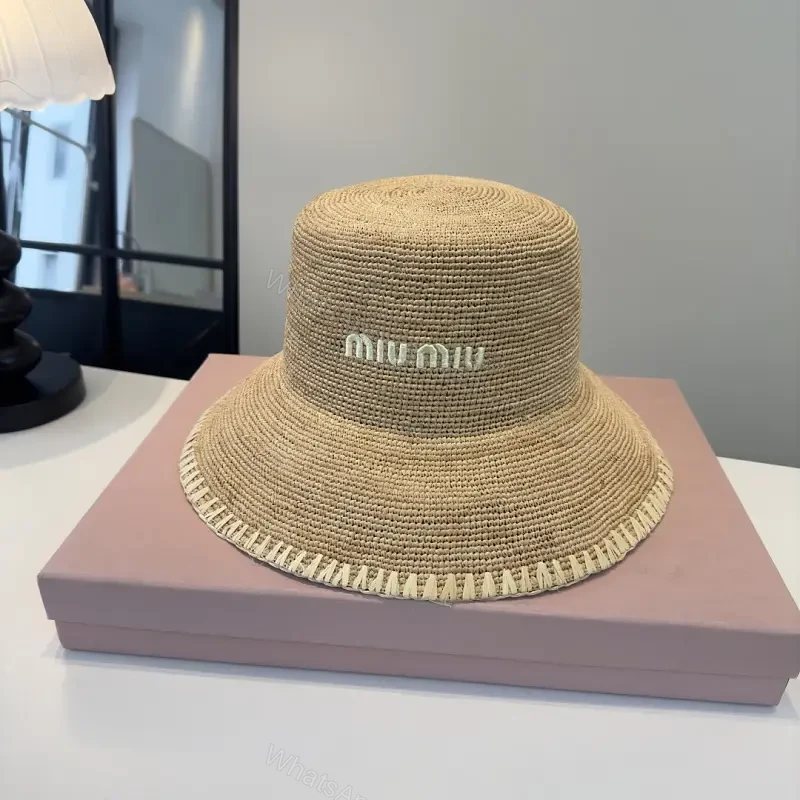 Natural Straw Bucket Hat with Subtle Logo Detail — view 1