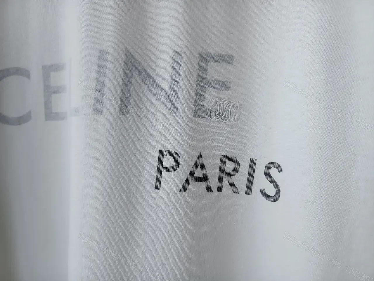 View 10 of Minimalist White Cotton Tee - Relaxed Luxe Comfort