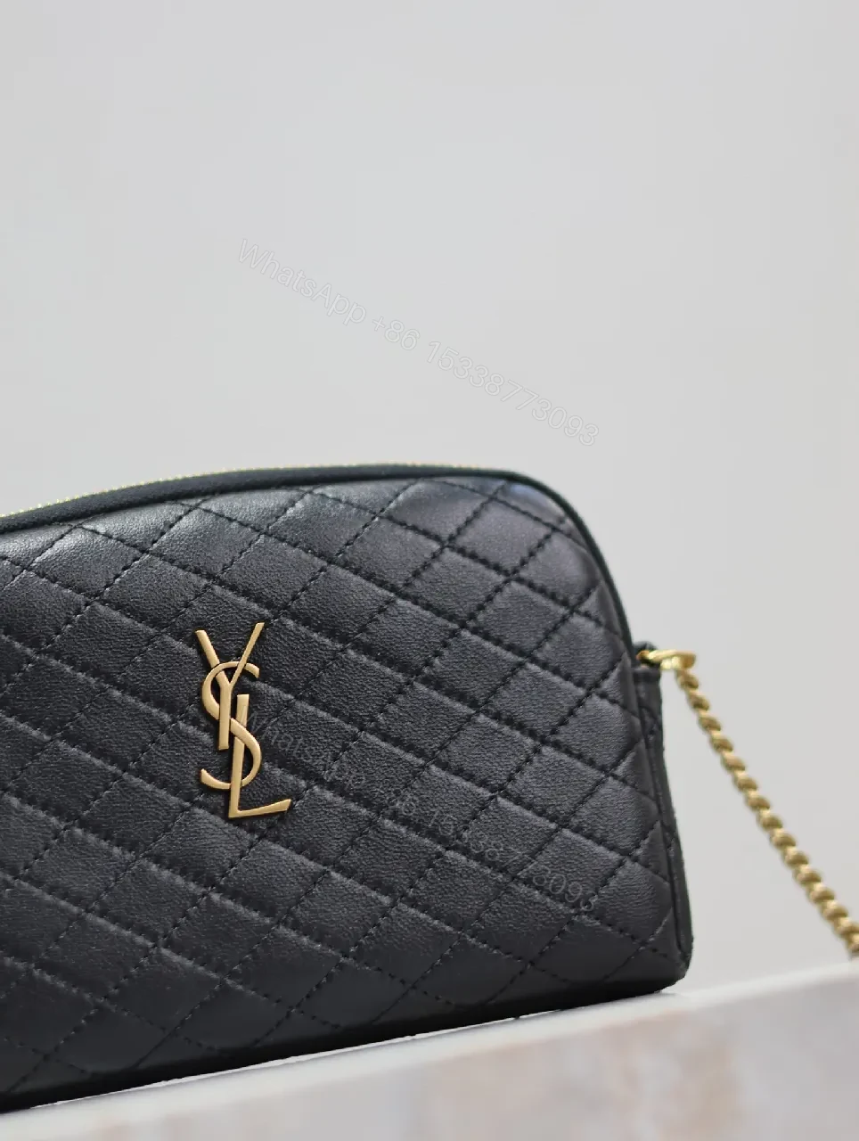 View 8 of Quilted Crossbody Bag with Gold Emblem, Compact Style