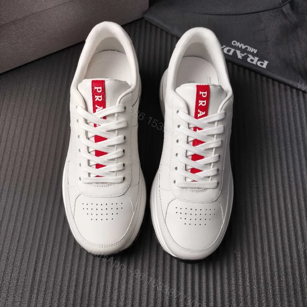 View 3 of Minimalist White Leather Trainers with Red Accent - Modern Comfort Lux