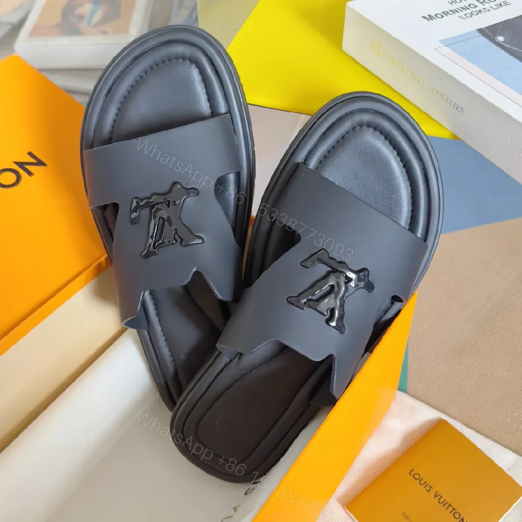 View 3 of Minimalist Black Leather Slides with Signature Emblem