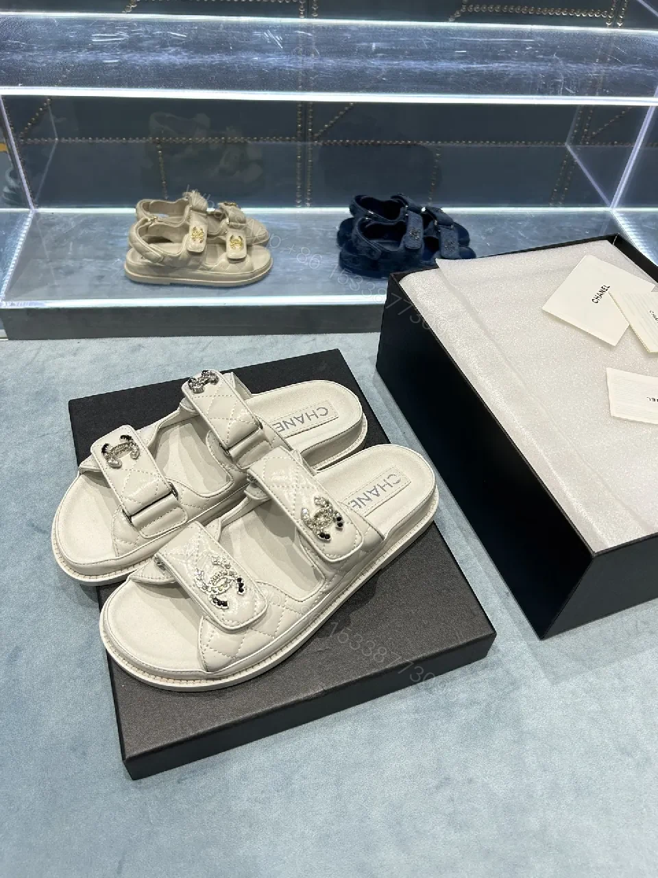 View 5 of Chic White Sandals with Quilted Straps and Logo Hardware