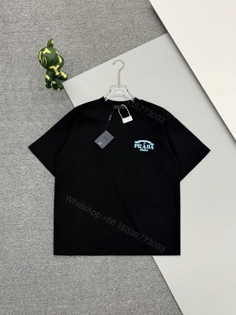 View 3 of Black Cotton Blend Tee with Prada Milano Graphic Embellishment