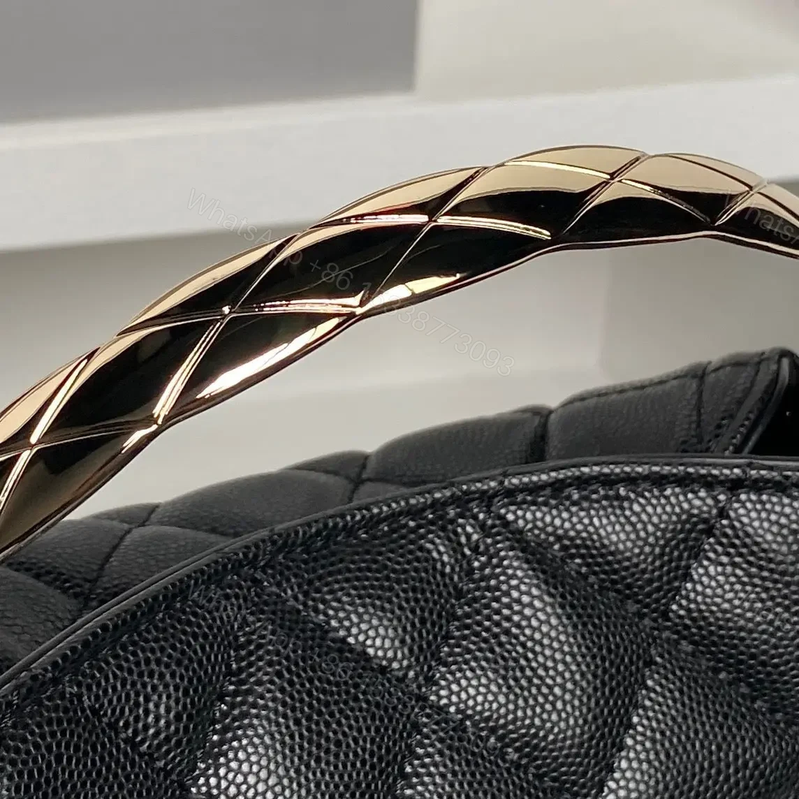 View 6 of Chanel 24A Hobo Handbag in black quilted caviar leather