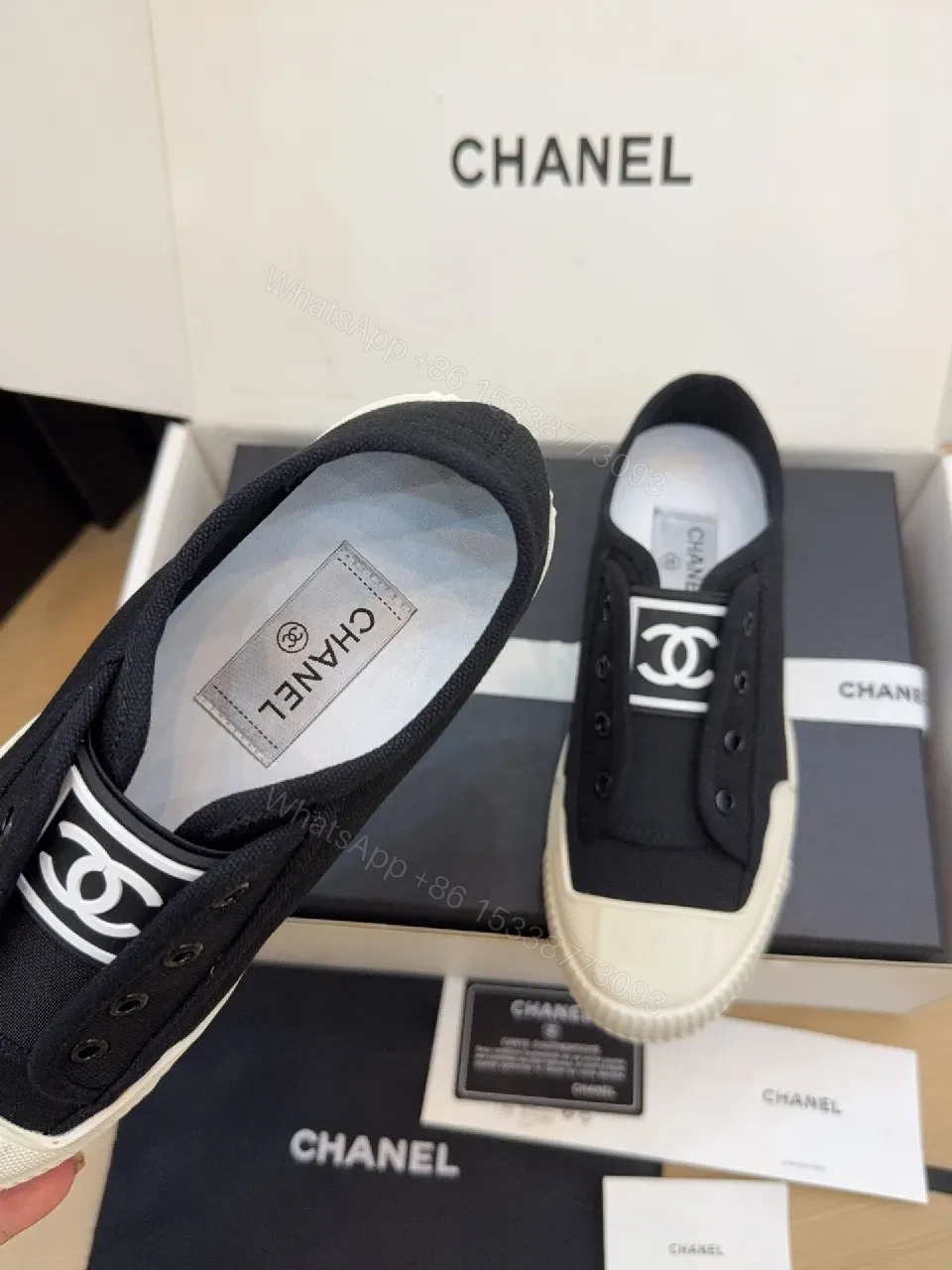 View 3 of Minimalist Black Canvas Sneakers with Logo Strap