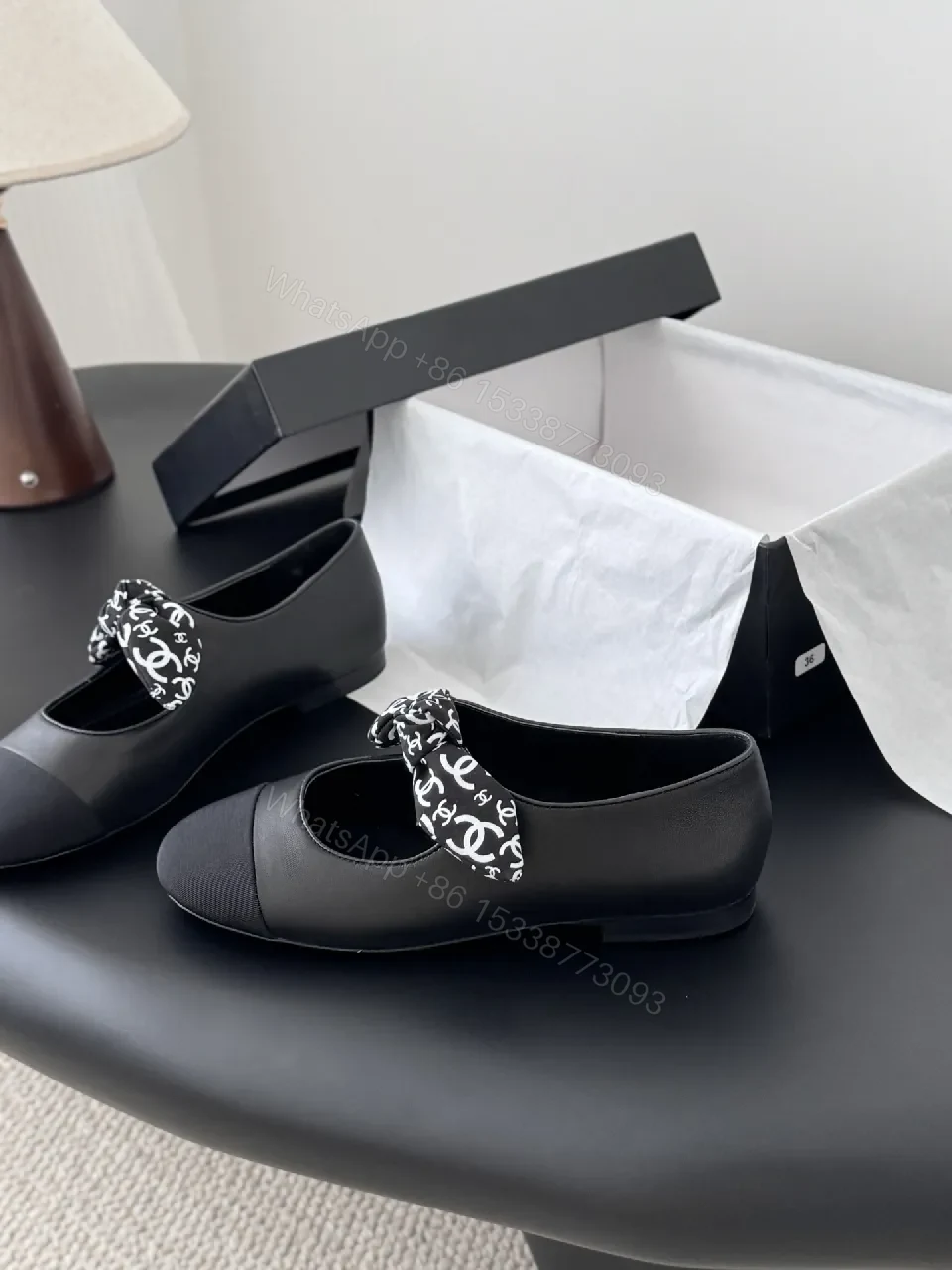 View 6 of Black Quilted Ballet Flats with Logo Bow - Chic, Comfortable Flats