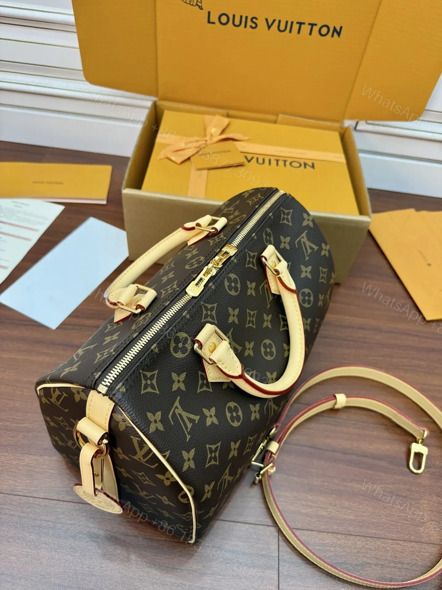 View 2 of Louis Vuitton Speedy Bandoulière 25 Handbag in Monogram