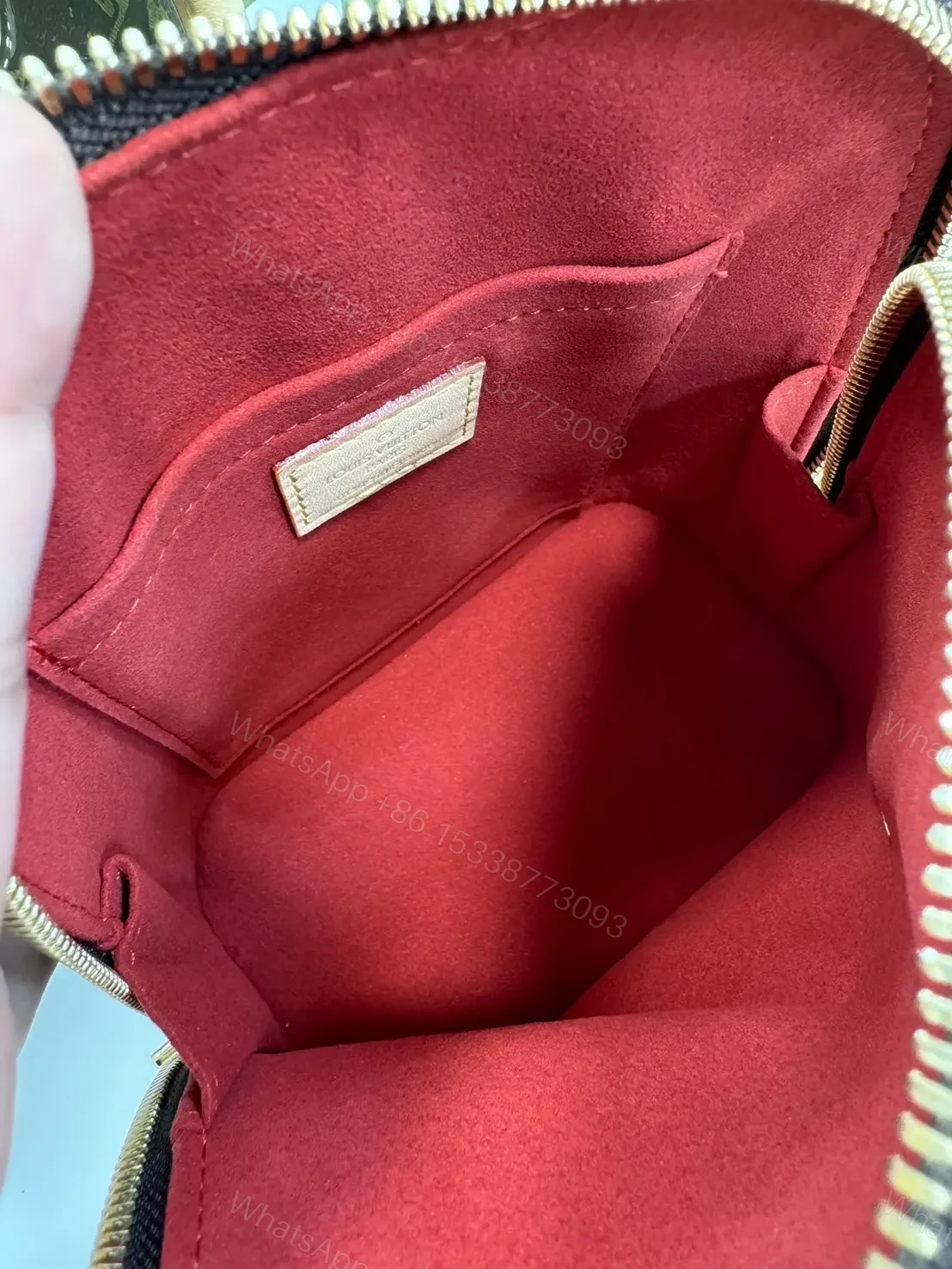 View 2 of Louis Vuitton Alma backpack in the signature brown monogram canvas