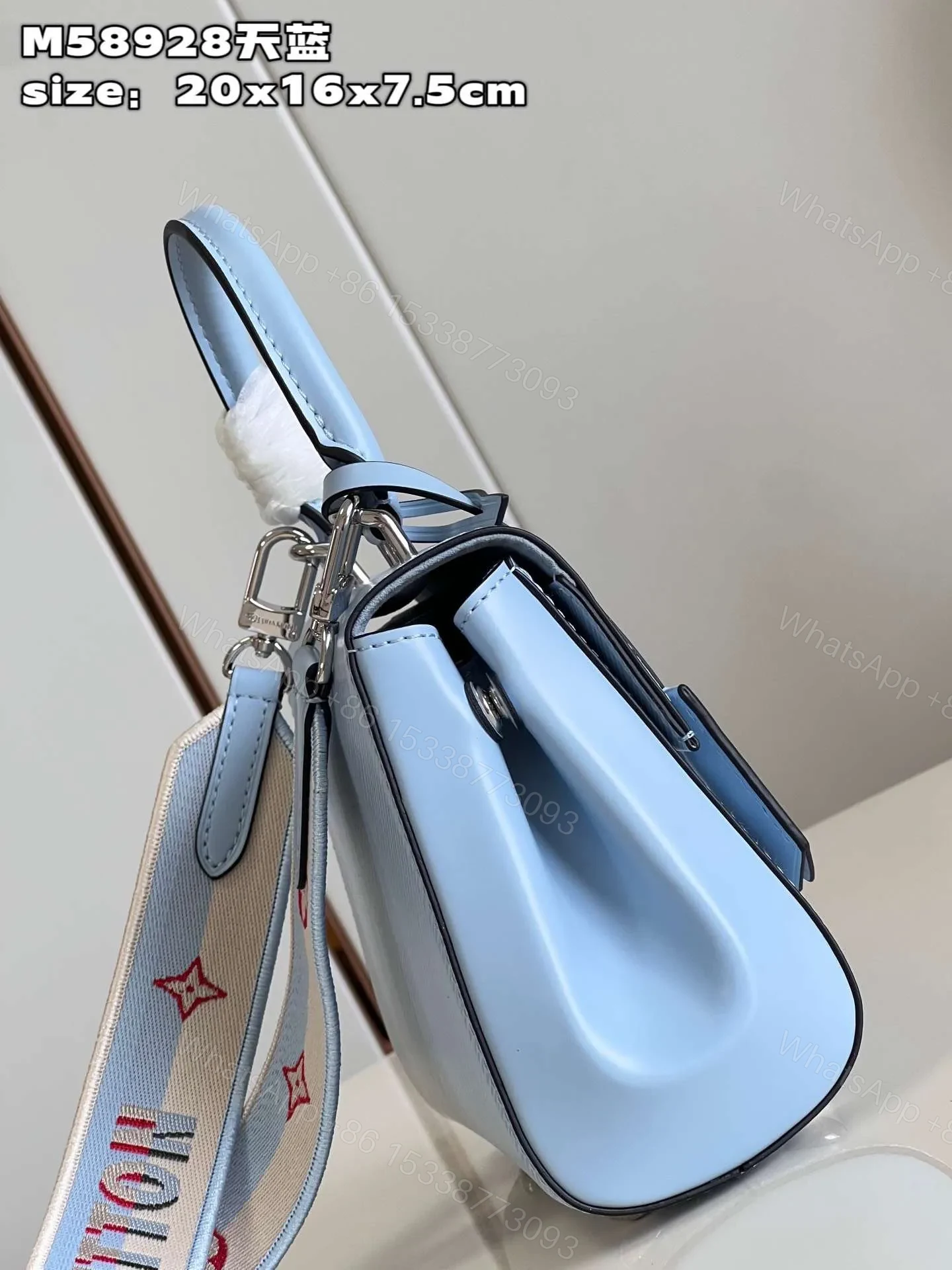 View 4 of Louis Vuitton Clunny Blue Raised Pattern Handbags 20x16cm