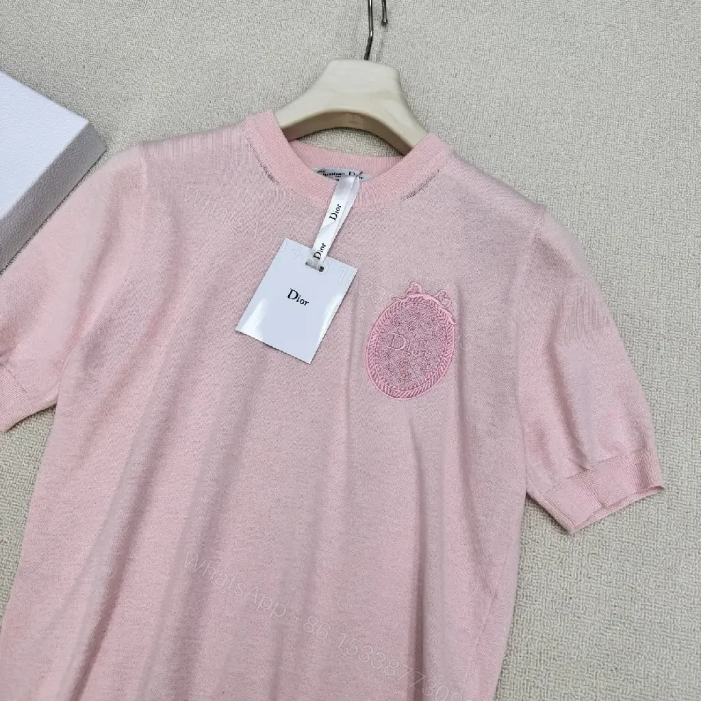 View 7 of Soft Pink Knit Top with Crest – Elegant Everyday Essential
