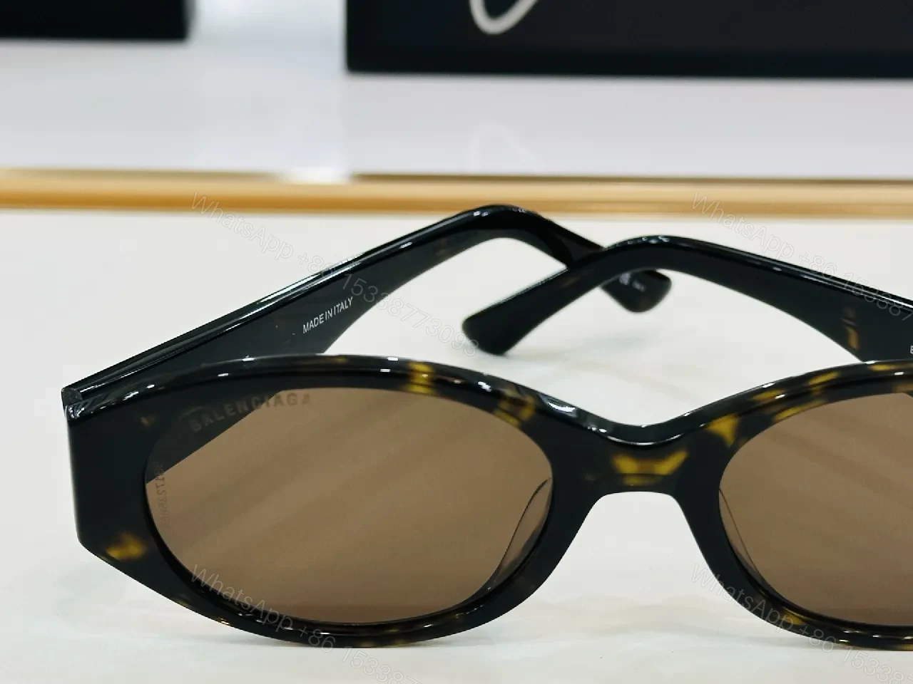 View 9 of Chic Black Acetate Cat-Eye Sunglasses: Luxury Comfort