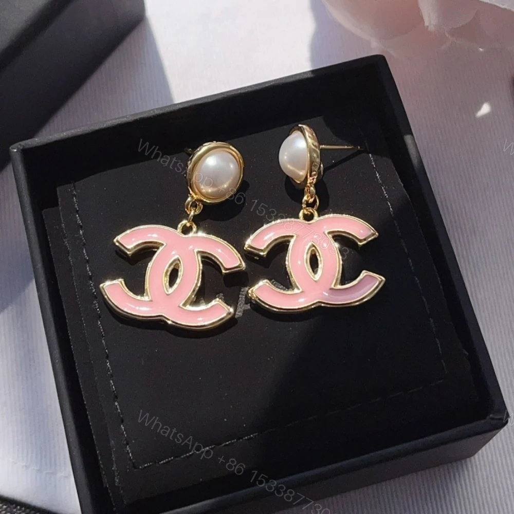 View 2 of CHANEL PENDANT EARRINGS PEARLY WHITE AND PINK ABF397 B19975 NAFTT