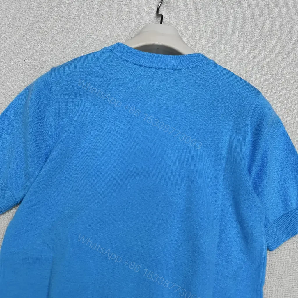 View 5 of Mineral Blue Knit Top with Crest – Elevated Weekend Layer, Mid-Weight