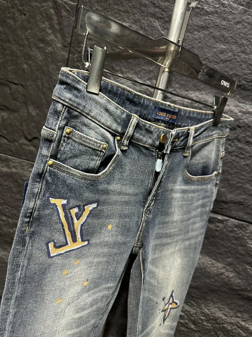 View 7 of Distressed Indigo Jeans with LV-Inspired Embellishments - Denim Luxe style