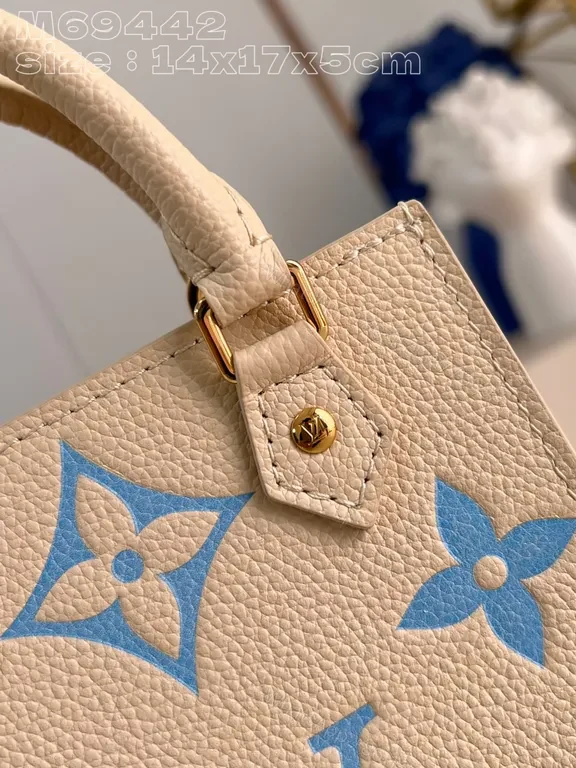 View 4 of Blue Monogram Calfskin Mini Top-Handle Bag - LV Chic Luxury