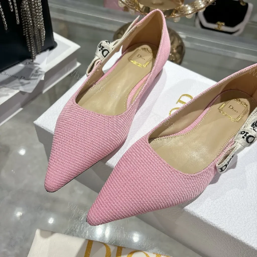 View 6 of Soft Pink Textured Slingback Heels with Logo Strap – Modern Luxe Pumps