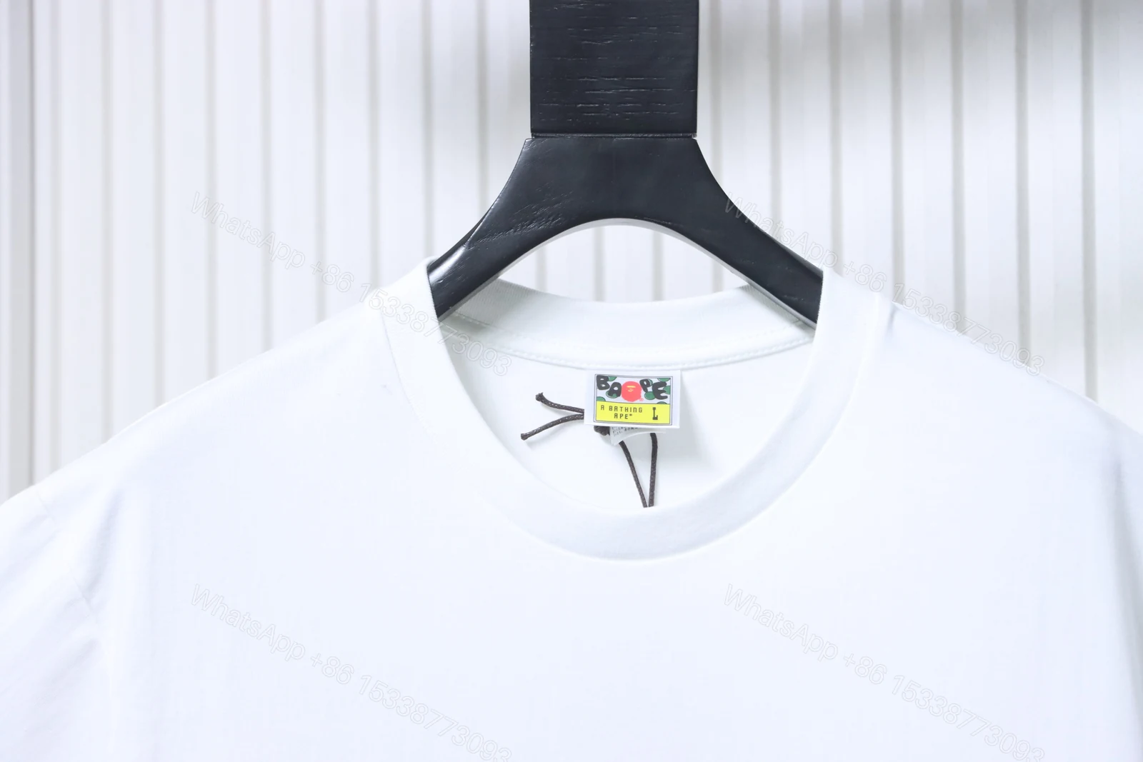 View 3 of BAPE check-pattern ape head letter print short-sleeved T-shirt in white