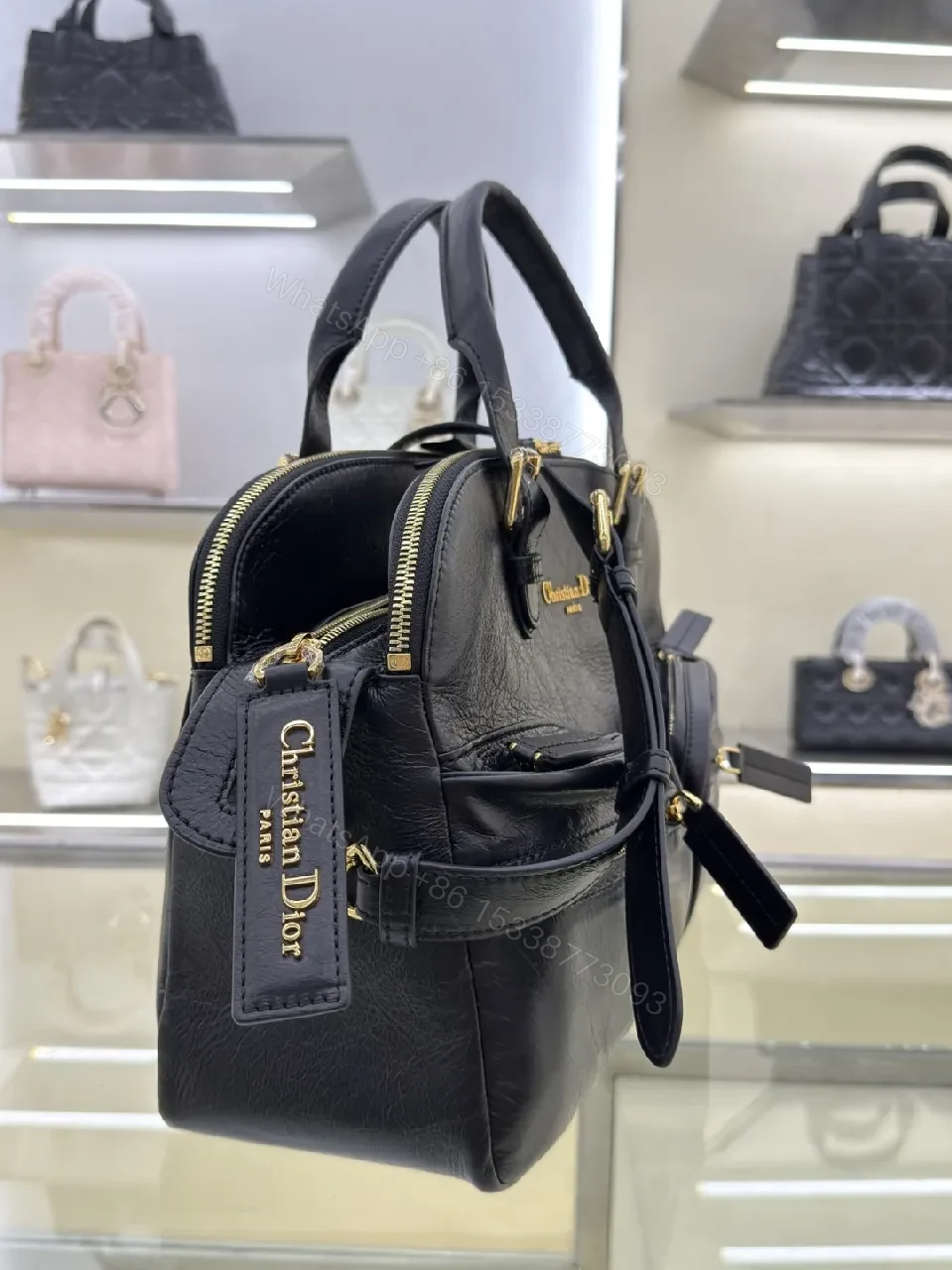 View 7 of Compact Luxury Satchel: Black Leather, Gold Hardware, Structured Style