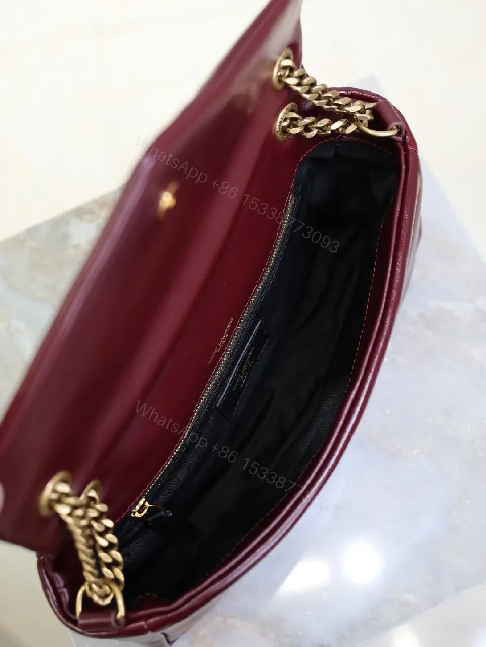 View 2 of Burgundy Calfskin Compact Shoulder Bag with Gold Hardware