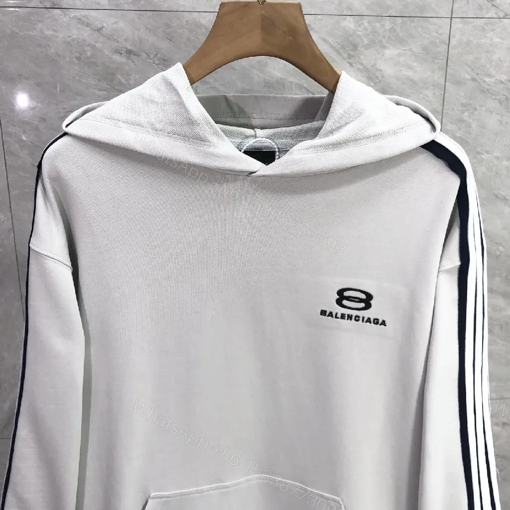 View 7 of Minimalist Sporty Hoodie with Striped Details in Knit Comfort