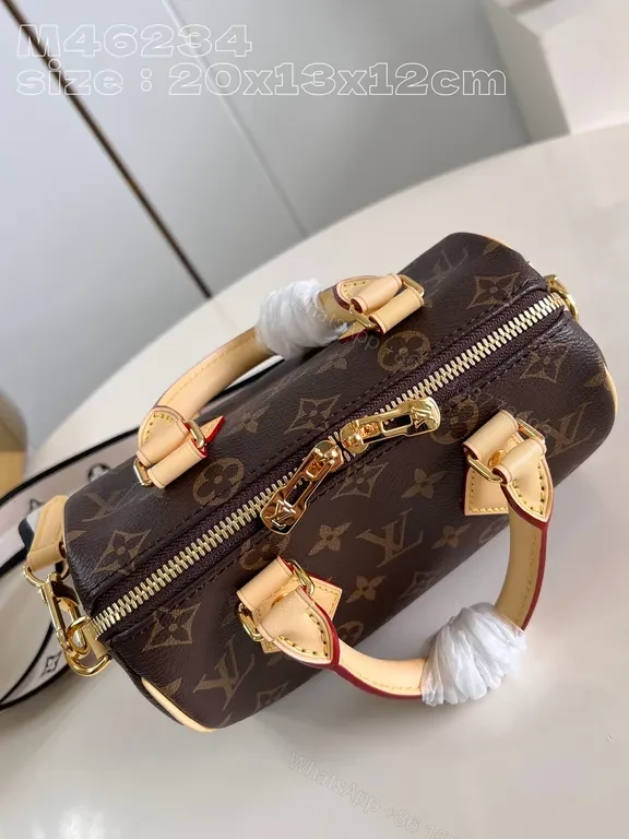 View 5 of Structured Monogram Mini Tote: Compact, All-Season Luxury