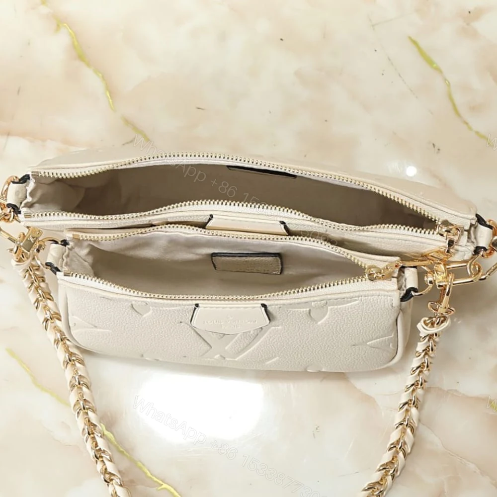 View 6 of Louis Vuitton Multi Pochette Accessoires Monogram Empreinte Cream 25Cm