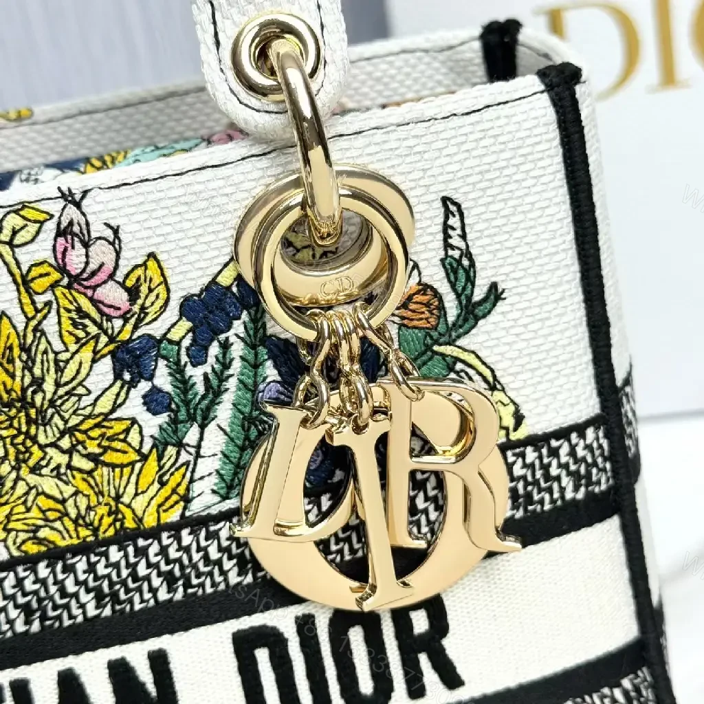 View 7 of Floral Satchel: Bold Botanical Print, Logo Band, Luxe Key Feature