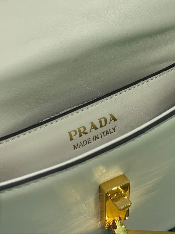 View 9 of Elegant Leather Crossbody Bag: Prada Triangle, Structured Luxury