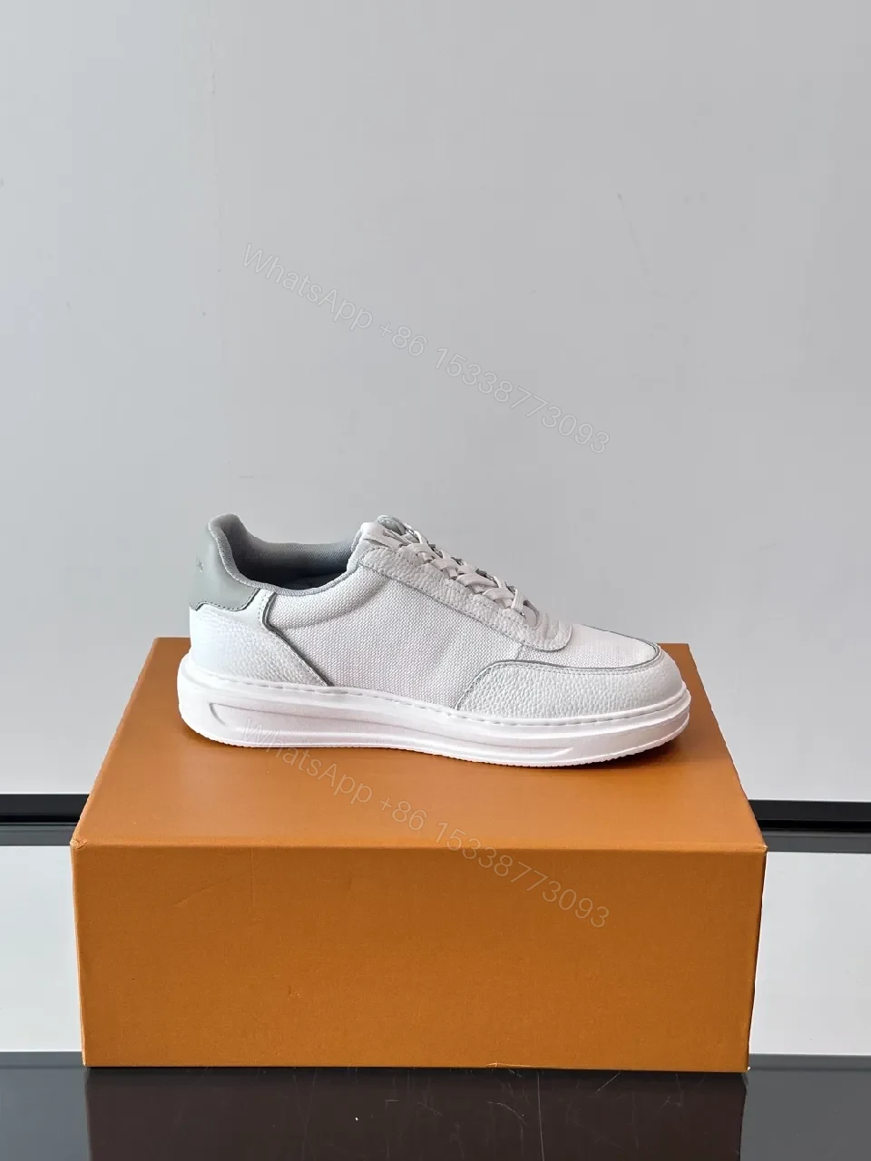 View 2 of Minimalist White Luxury Sneaker: Sculpted Comfort Footwear