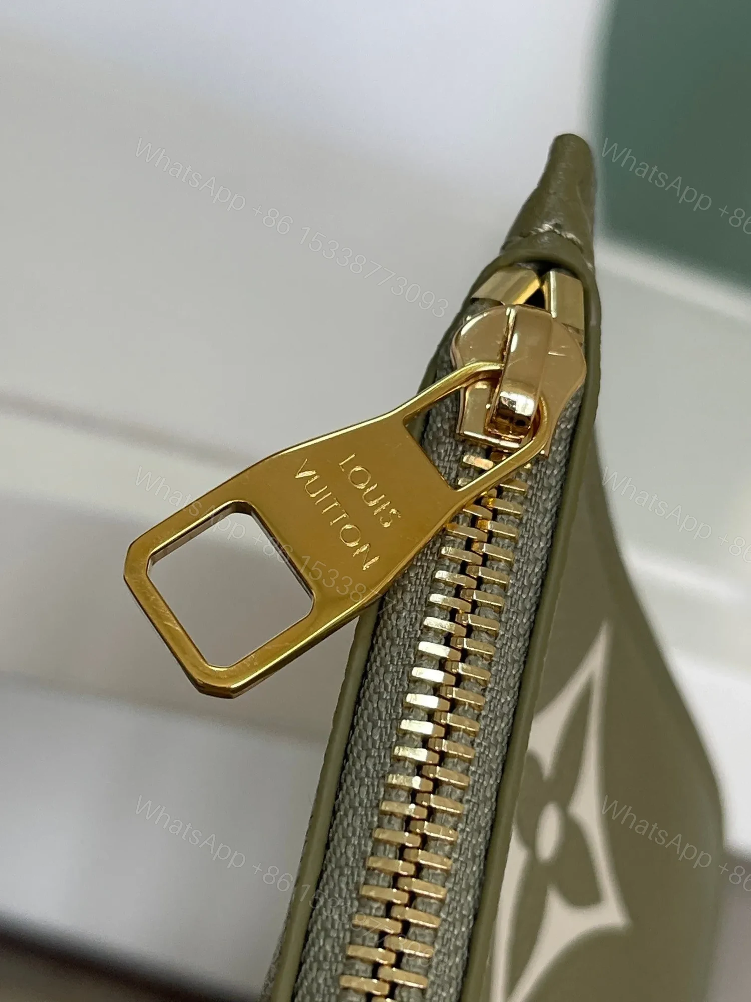 View 7 of LV NEVERFULL MM KHAKI CREAM MONOGRAM EMPREINTE LEATHER