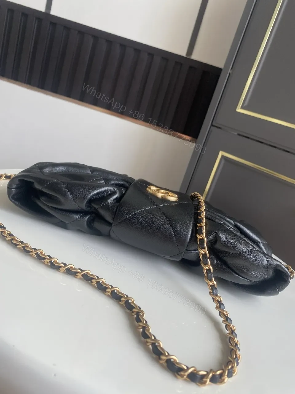 View 8 of Quilted Mini Bag: Black, Satin-like, Chic, Gold Hardware, Clutch