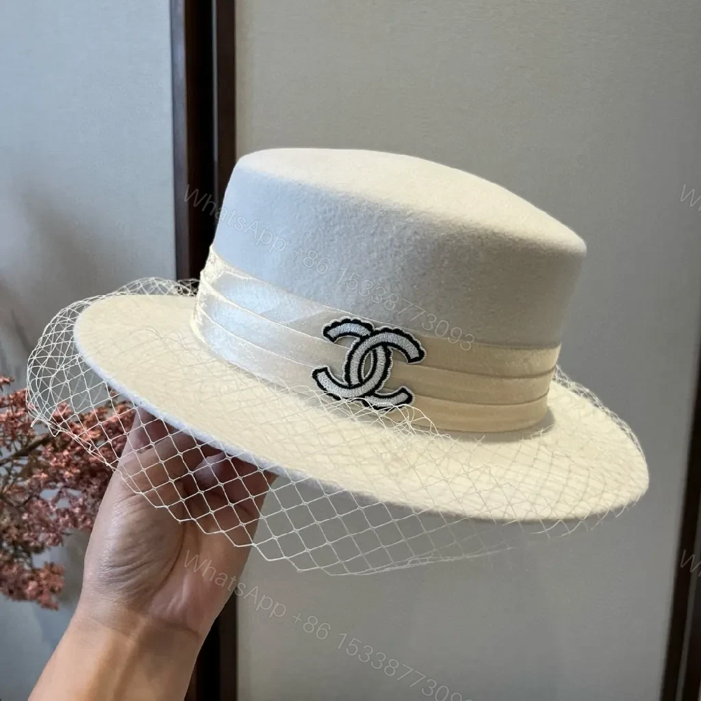 View 2 of Ivory Felt Fedora with Veil & Emblem Accent
