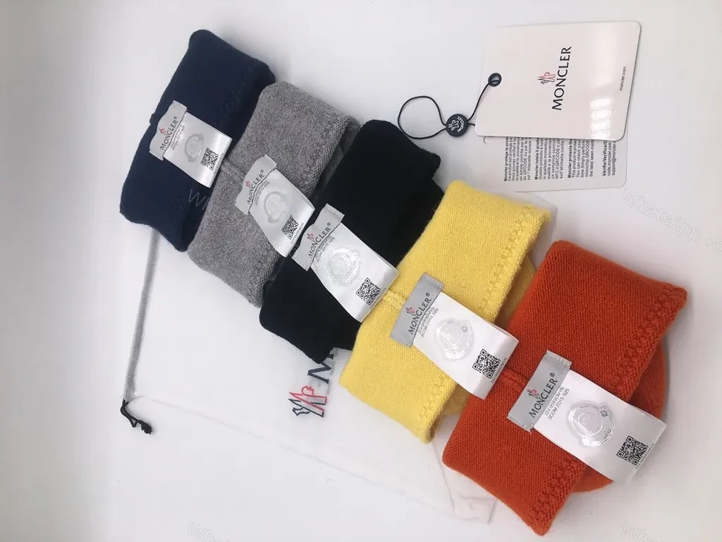View 4 of Sunny Yellow Moncler Pom Beanie â€“ Luxurious Warmth, Bold Color Pop