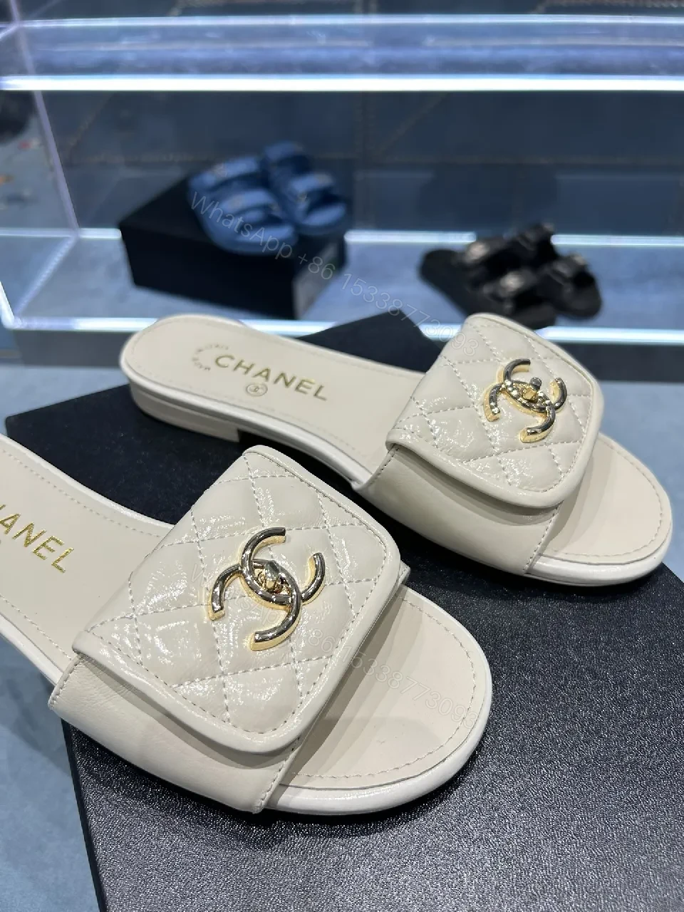View 8 of Beige Quilted Strap Slide Sandals with Gold Double-C Logo