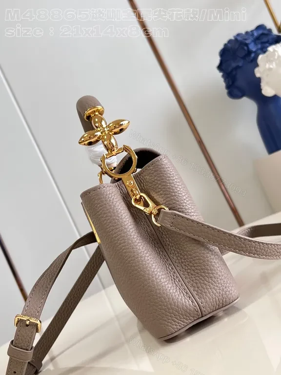 View 2 of Taupe Pebbled Leather Crossbody: Gold LV Accent, Compact Luxury Bag