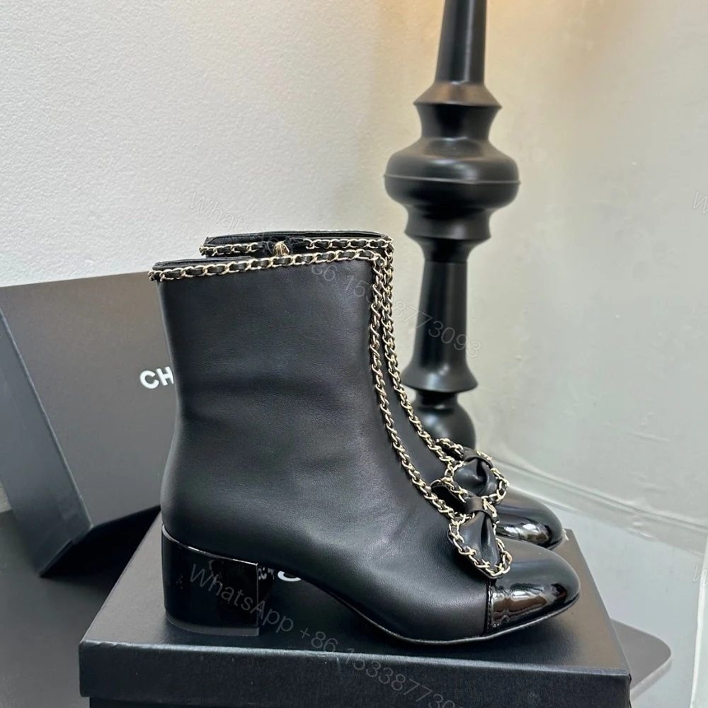 View 2 of CHANEL RIBBON CHAIN BOOTS BLACK G45899 B17974 94305