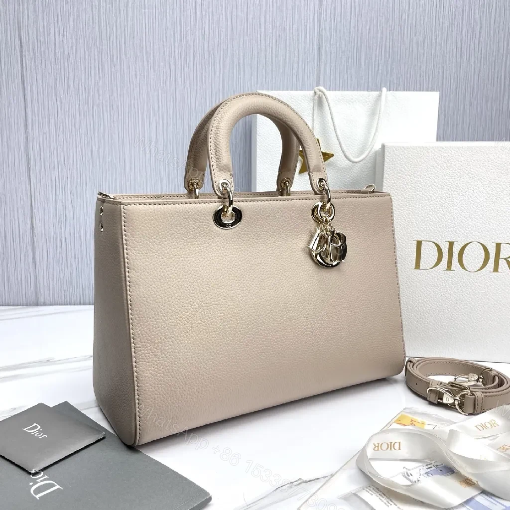 View 2 of Soft-Texture Satchel in Pebbled Leather with Signature Charms